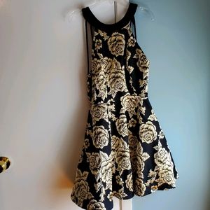 Black and gold mini dress